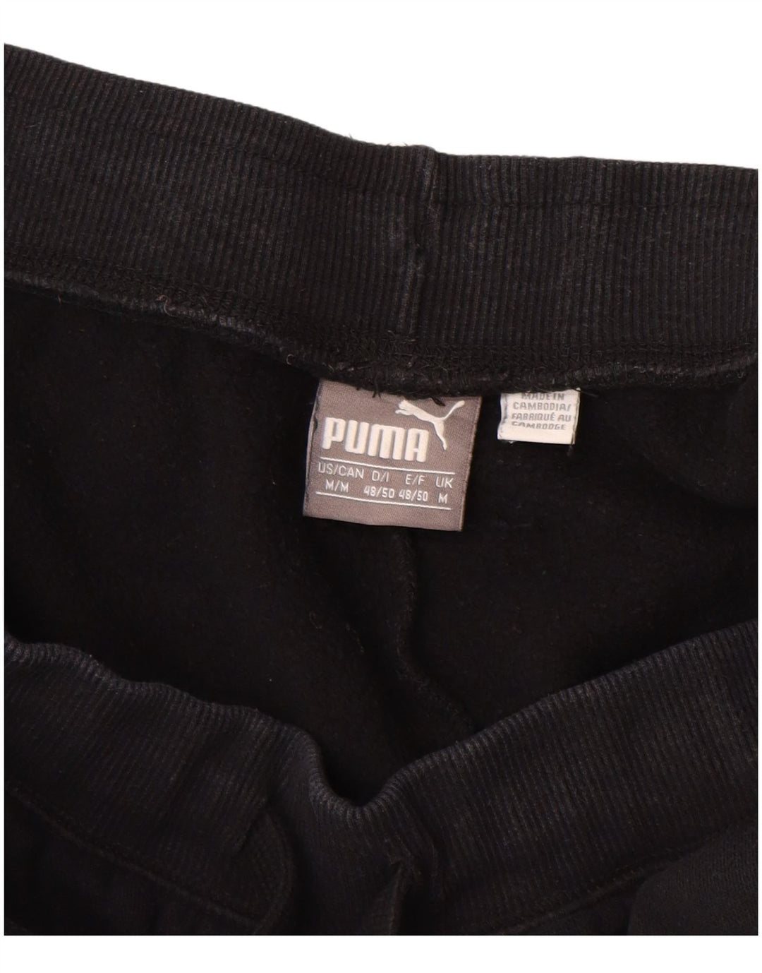 Damskie spodnie dresowe PUMA UK 12, średnia czarna bawełna