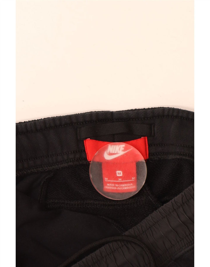 Męskie spodnie dresowe Nike, joggery, średnia czarna bawełna