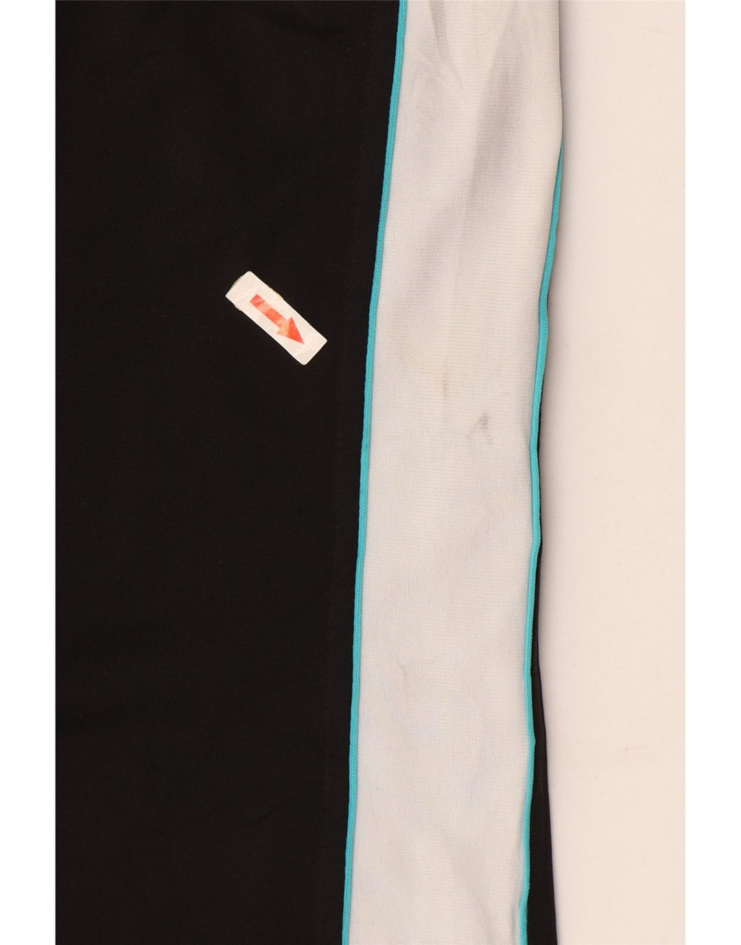 Damskie spodnie dresowe PUMA UK 14, duży czarny poliester z blokami kolorów