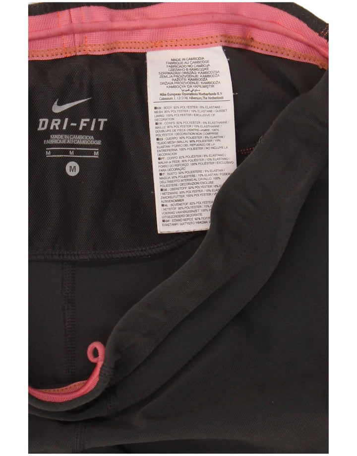 Damskie spodnie dresowe Nike Dri Fit Capri UK 14, średni czarny poliester