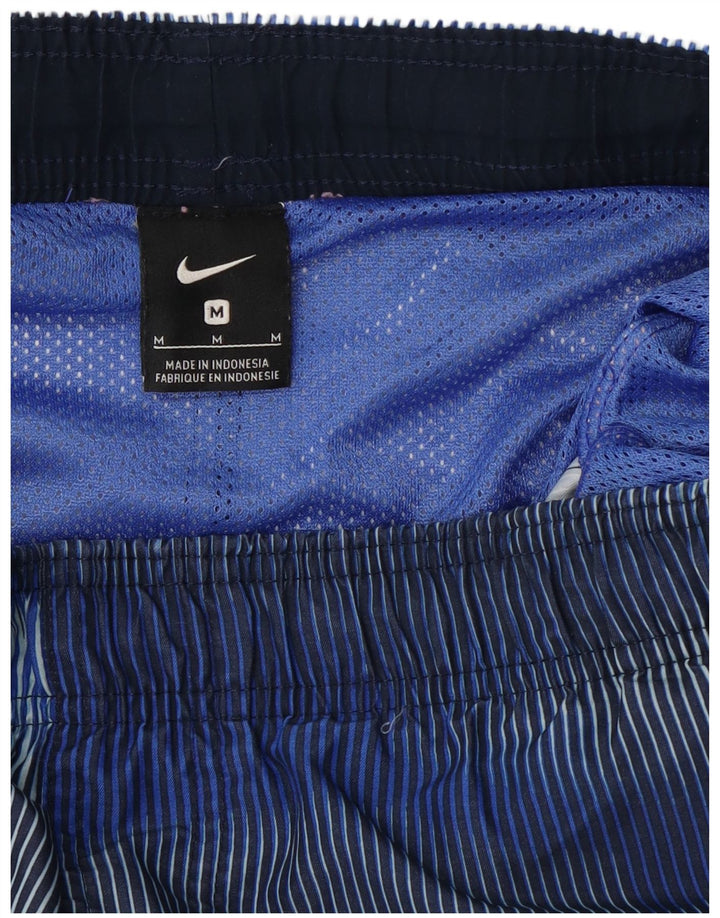 Męskie spodenki sportowe Nike w kolorze średniego niebieskiego w prążki