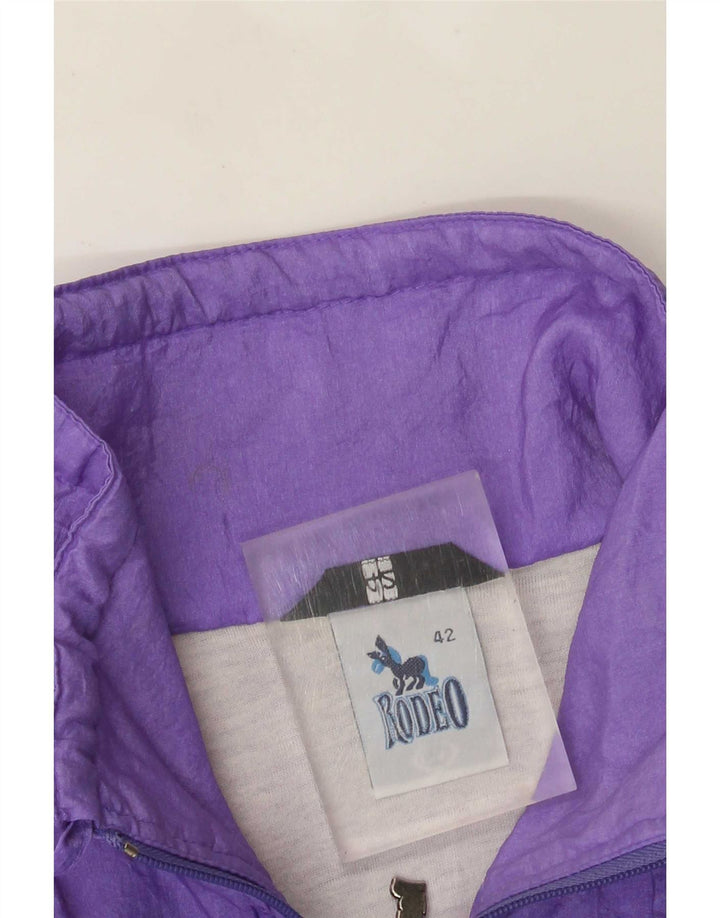 Damska, oversize'owa kurtka przeciwdeszczowa Rodeo EU 42, duży, fioletowy nylon