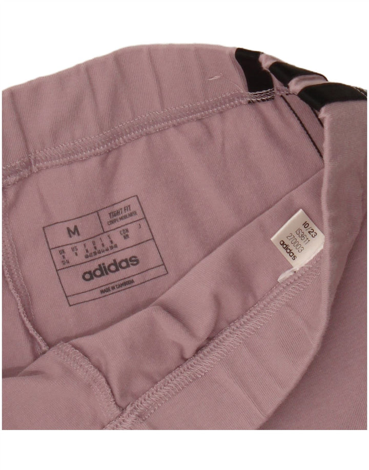 Damskie spodnie dresowe ADIDAS o dopasowanym kroju, UK 12/14, średni róż