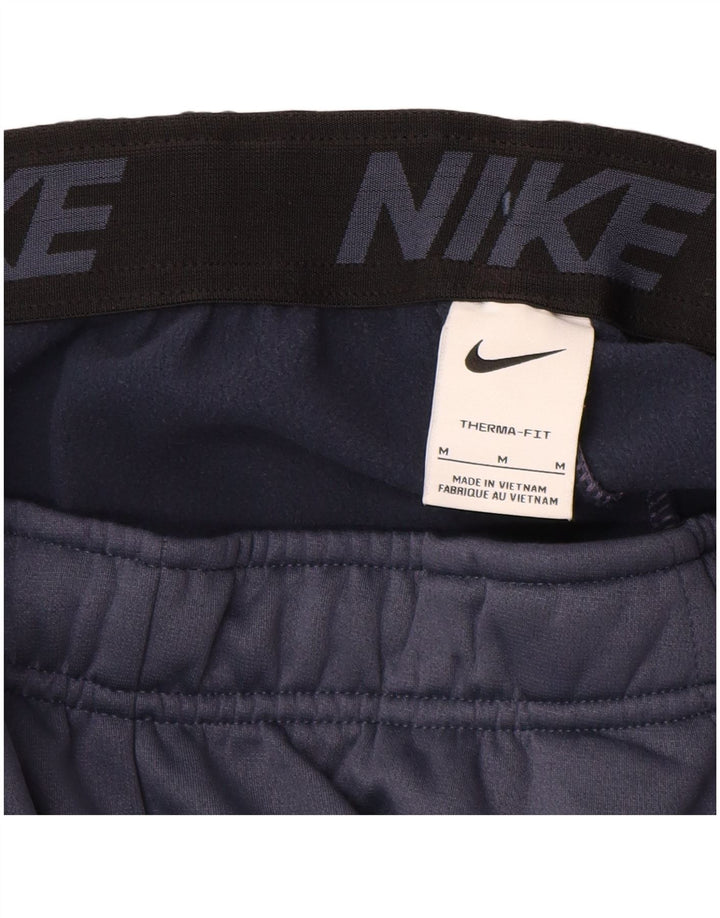 Męskie spodnie dresowe Nike Therma-Fit Joggery, małe, granatowe, poliestrowe
