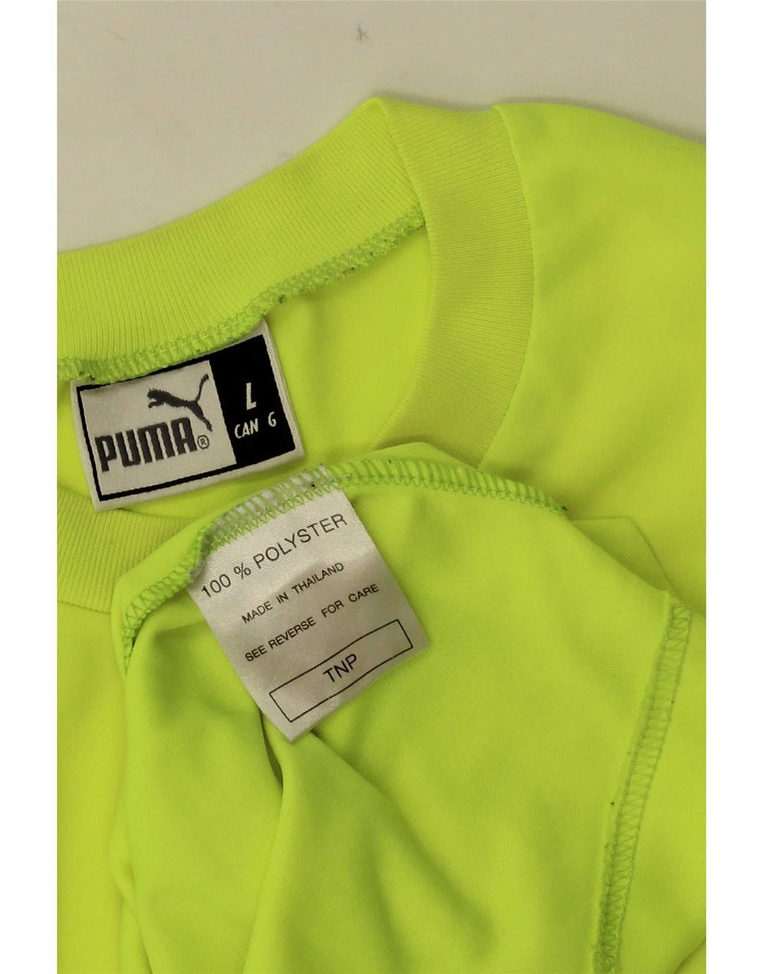Męski T-shirt Puma z grafiką, duży, żółty poliester z blokami kolorów