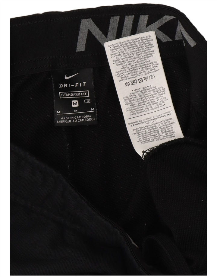 Męskie spodnie dresowe NIKE Dri Fit o standardowym kroju, średnia czerń