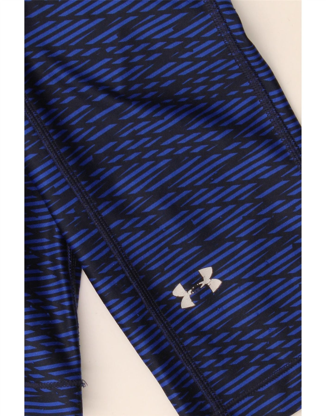 Damskie legginsy Capri UNDER ARMOUR UK 14 Średni granatowy geometryczny