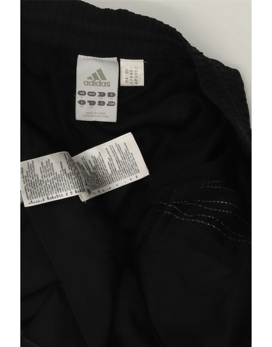 Damskie spodnie dresowe Adidas Clima Proof UK 12, średni czarny poliester