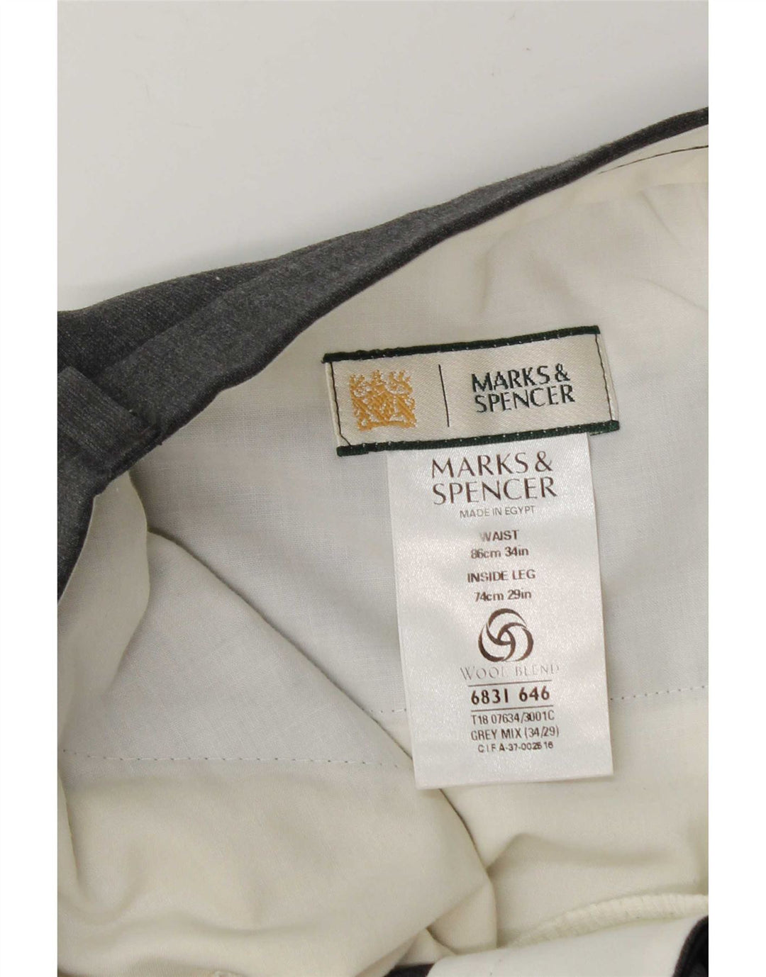 Męskie spodnie garniturowe Marks & Spencer W34 L29 Szary poliester