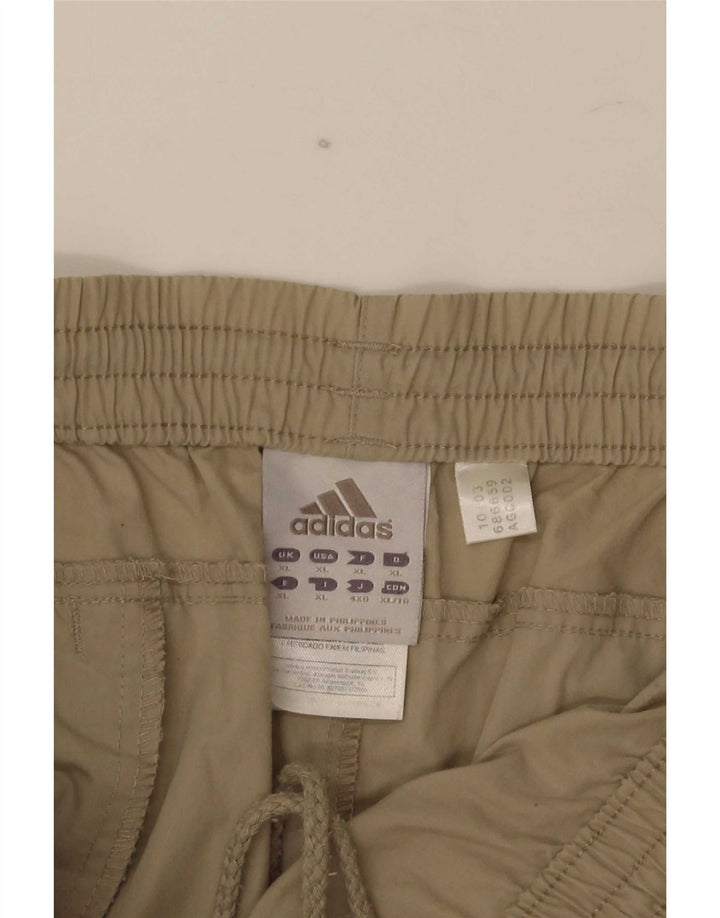 Męskie spodnie dresowe Adidas Capri XL beżowy poliester