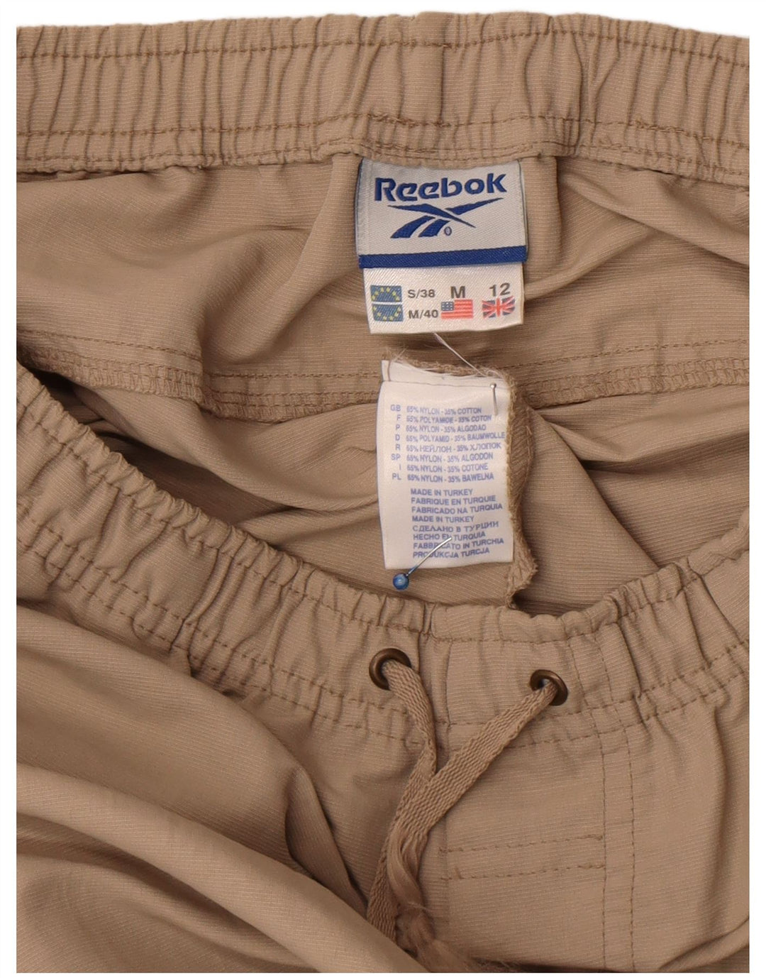 Damskie spodnie dresowe Reebok UK 12 Średni beżowy nylon