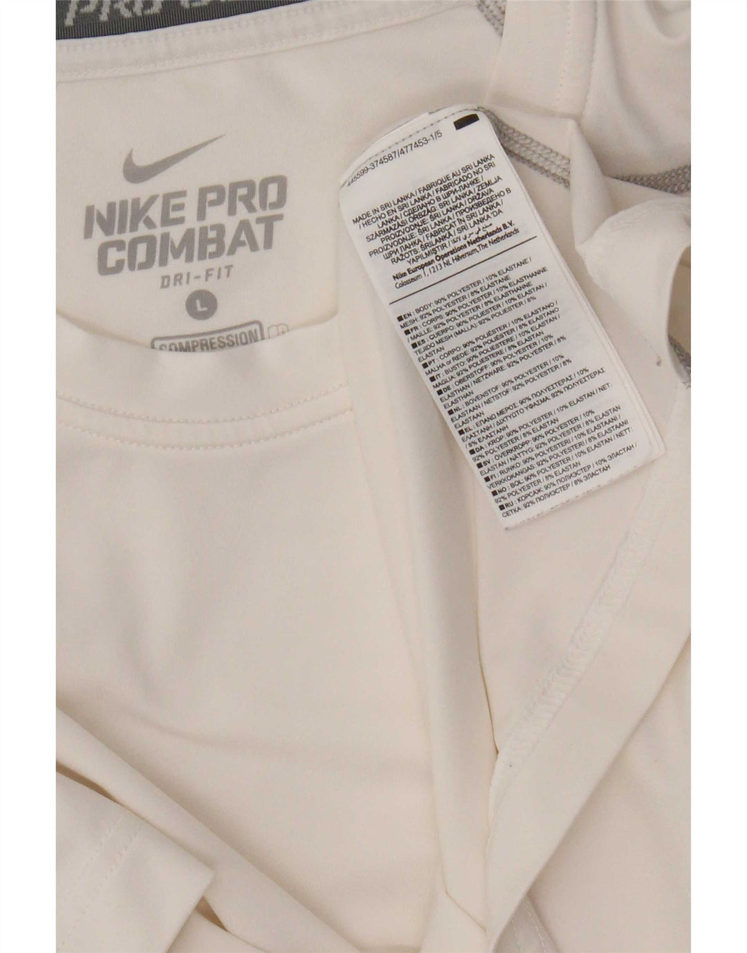 Damska koszulka Nike Dri Fit Top UK 14, duża, biała, poliester