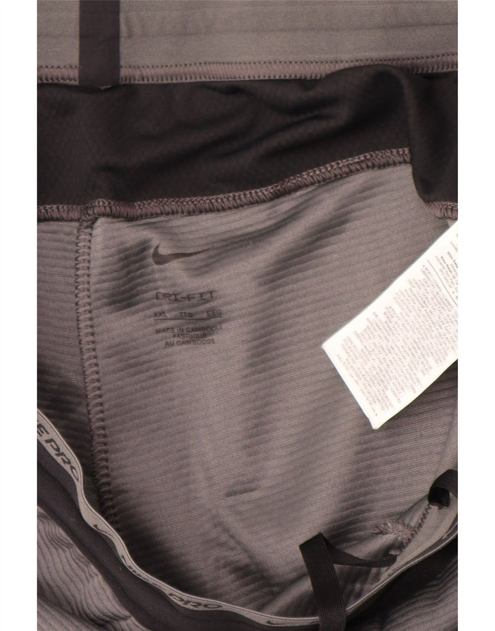 Męskie spodnie dresowe Nike Dri Fit 2XL, szary poliester z blokami kolorów