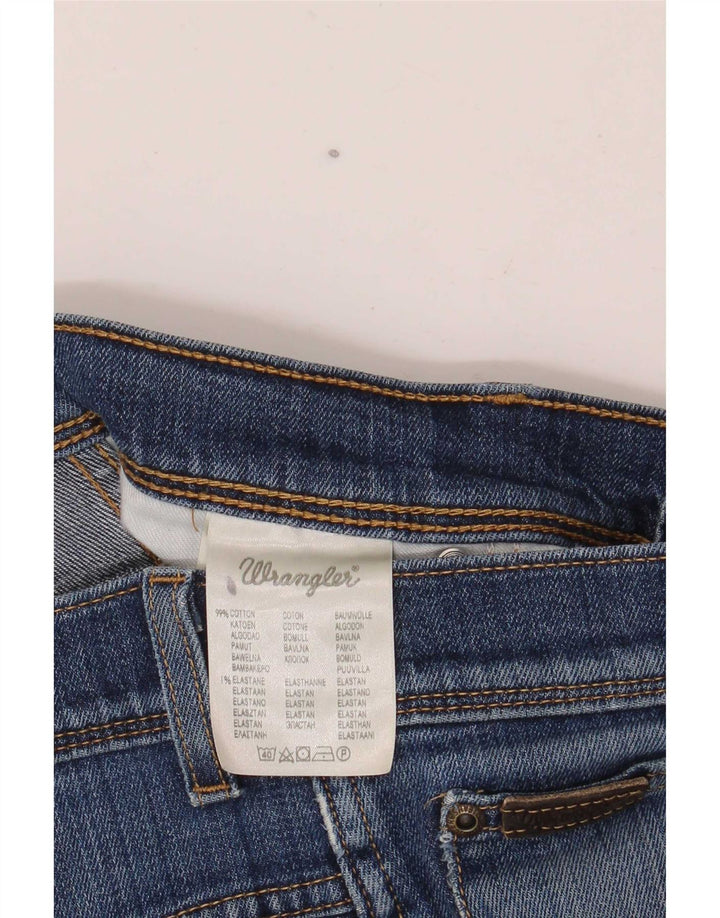 Damskie jeansy Wrangler Texas Stretch w trudnej sytuacji, proste W32 L32, niebieska bawełna