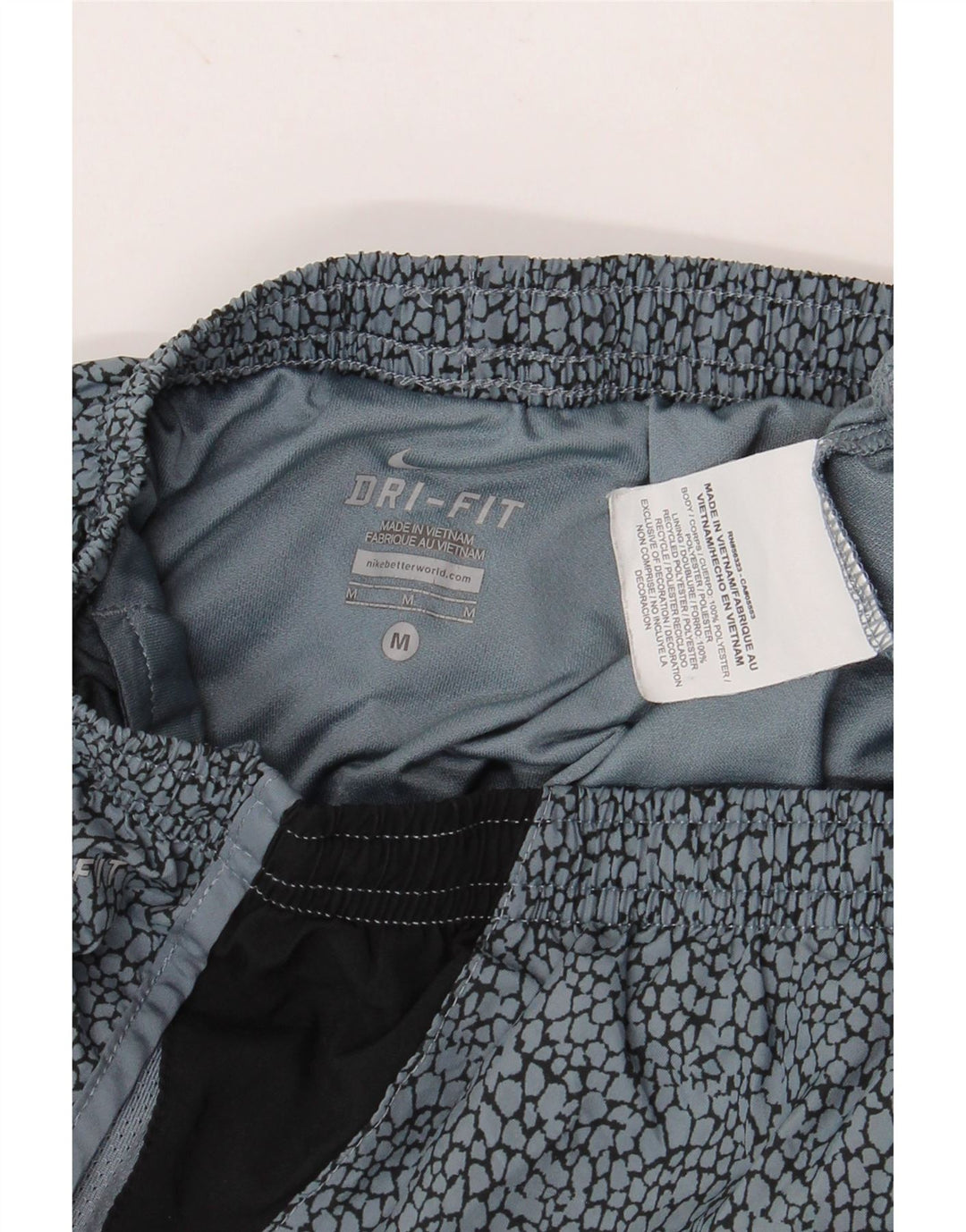 Damskie spodenki sportowe NIKE Dri Fit UK 12, poliester w kolorze średnioniebieskim