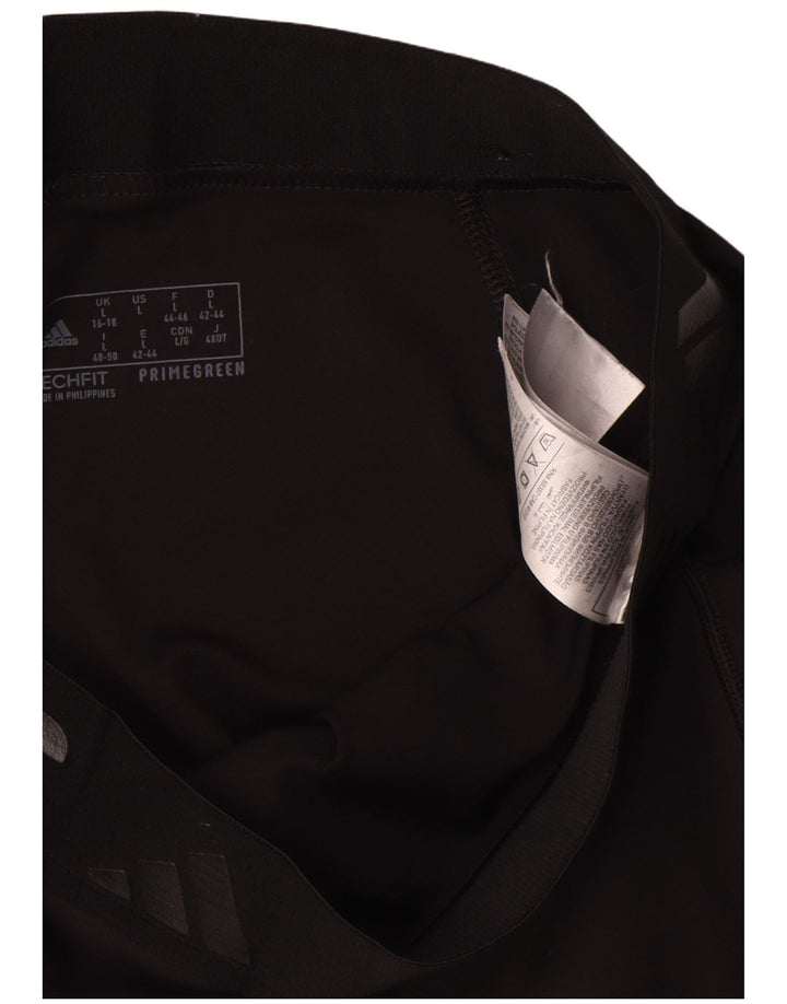 Damskie legginsy Adidas Graphic UK 16/18, duże, czarne, poliestrowe