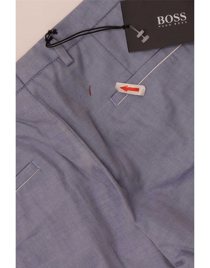 Męskie spodnie typu slim chino Hugo Boss W34 L33 niebieskie