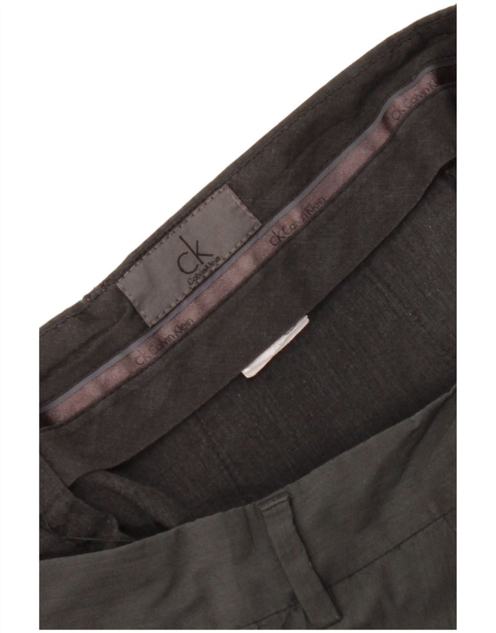 Męskie spodnie typu slim chino CALVIN KLEIN W32 L28 szare