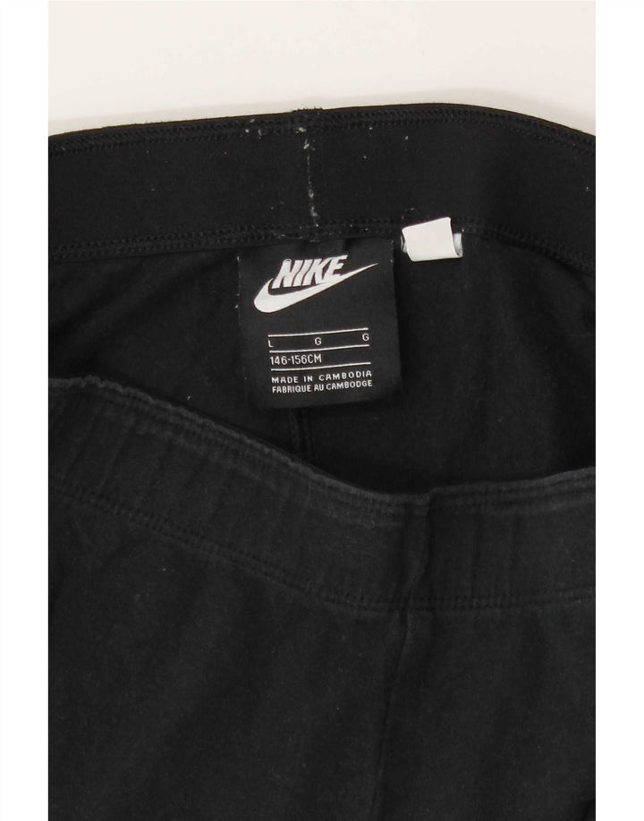 Dziewczęce legginsy z grafiką Nike 12-13 lat, duże, czarne