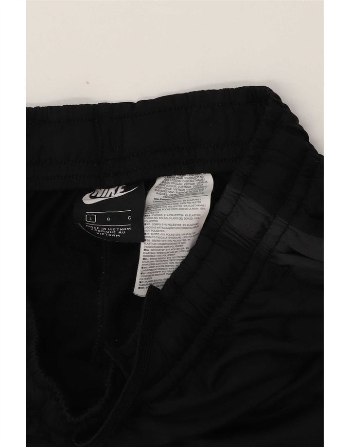 Męskie spodnie dresowe Nike Joggery, duży czarny poliester z blokami kolorów