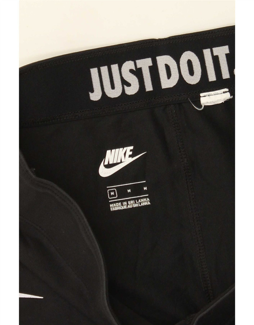 Damskie legginsy Nike Graphic UK 12, średnie czarne