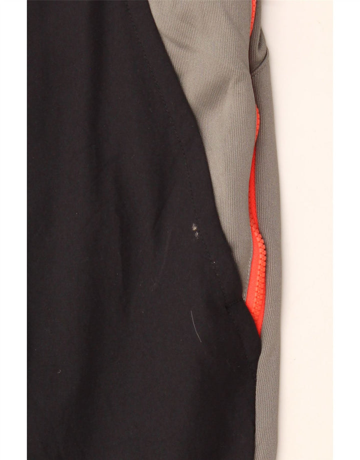 Męskie spodnie dresowe NIKE Joggery Średnioszary poliester w blokach kolorów