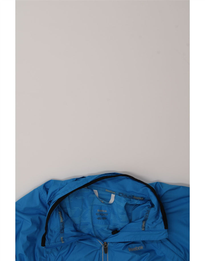 REEBOK Mens Tracksuit Top Jacket XL Blue Colourblock Polyester Vintage Reebok and Second-Hand Reebok from Messina Hembry 
