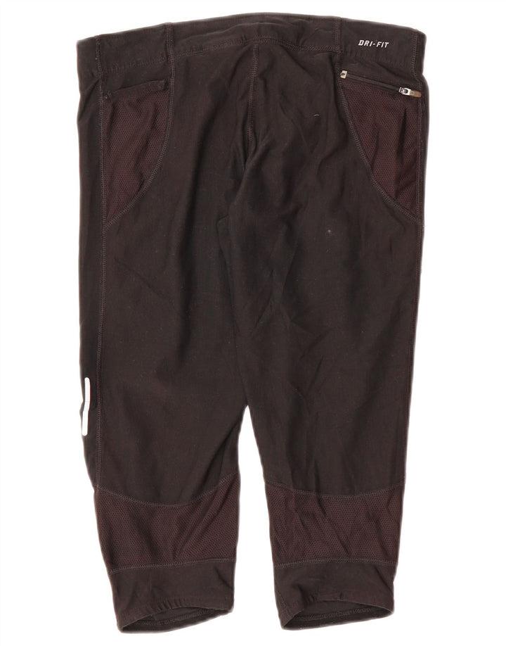 Damskie spodnie dresowe NIKE Dri Fit Capri UK 12, średni czarny poliester