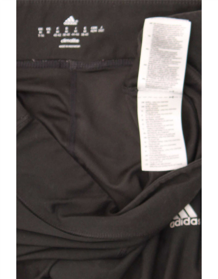 Damskie legginsy Adidas Graphic UK 12 W30 L25 Czarny poliester