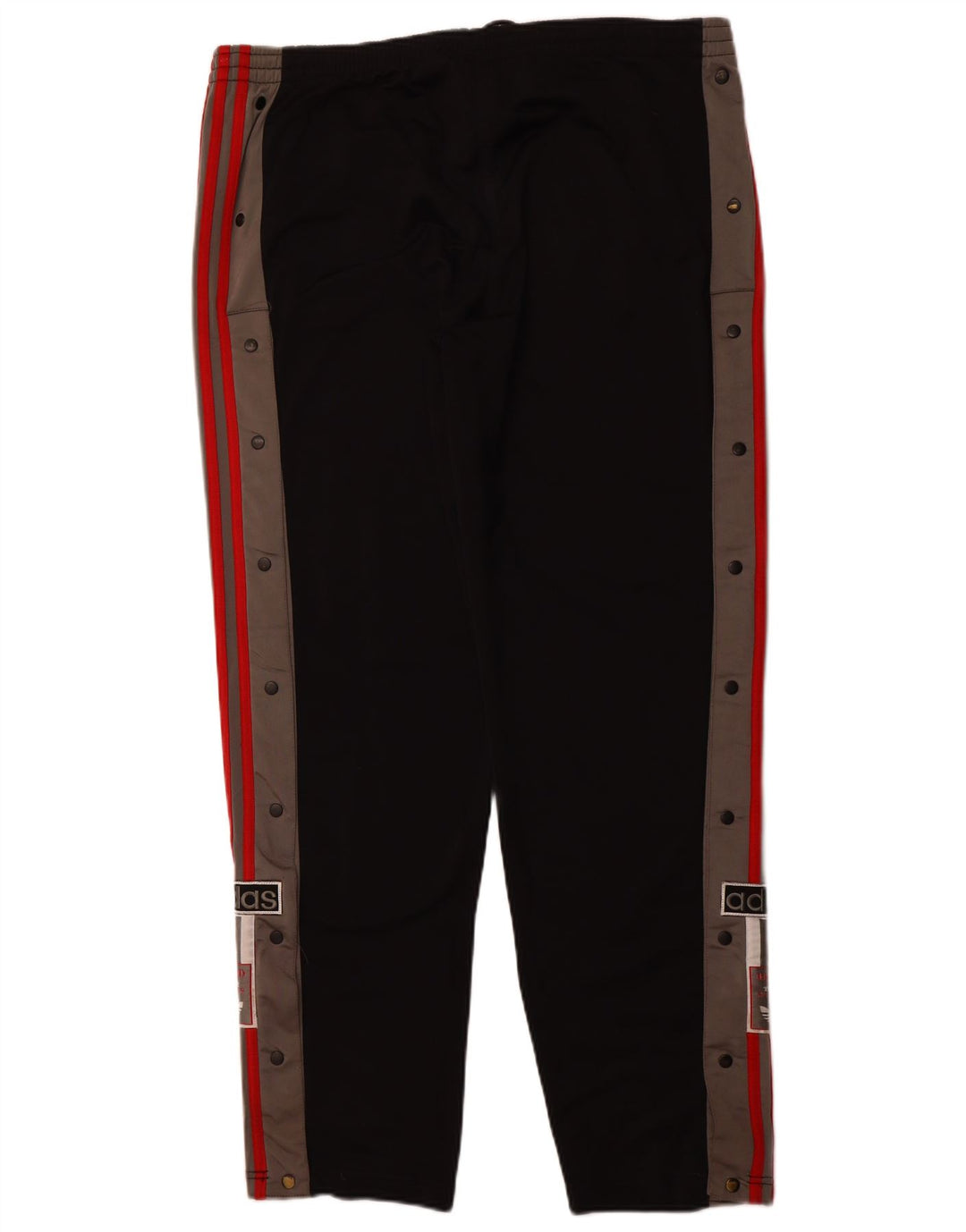 Damskie spodnie dresowe ADIDAS z grafiką, duże, czarne, sportowe z blokami kolorów