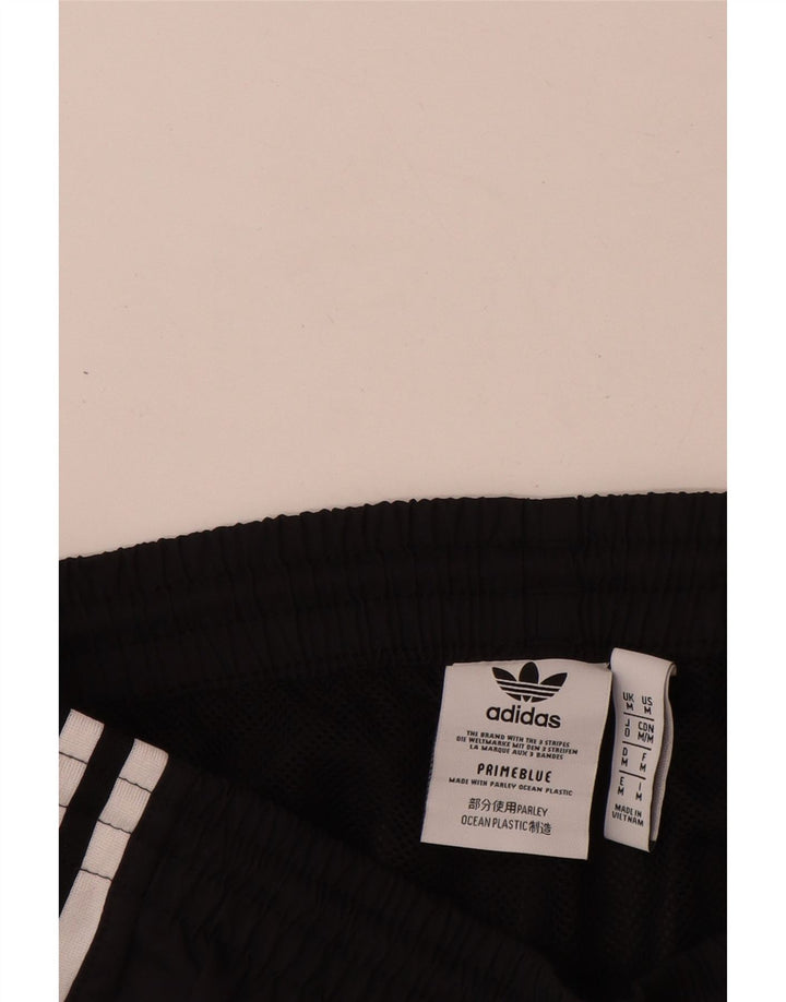 Męskie spodnie dresowe Adidas z grafiką, średnie czarne, poliestrowe
