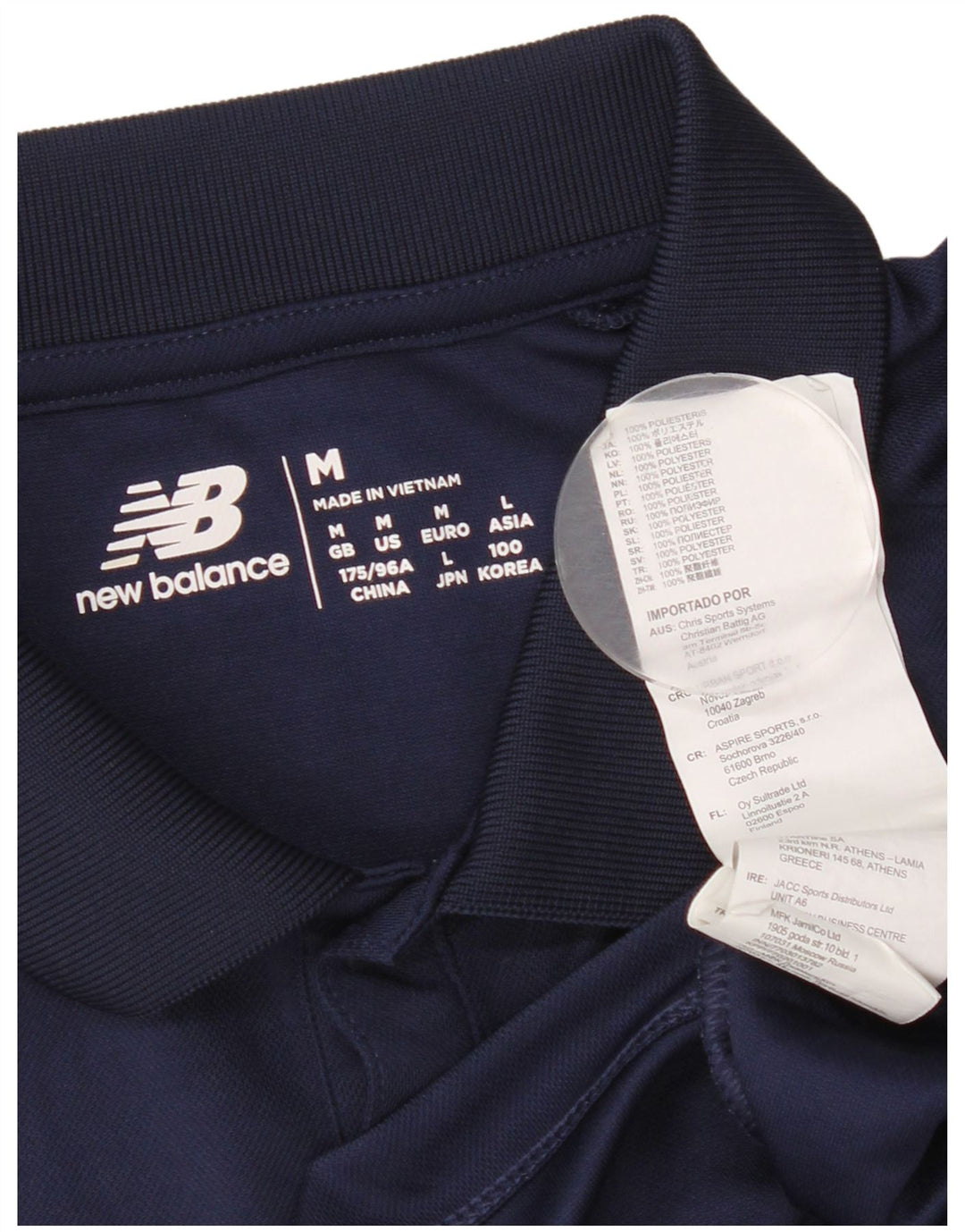 Męska koszulka polo New Balance z grafiką, średni granatowy poliester