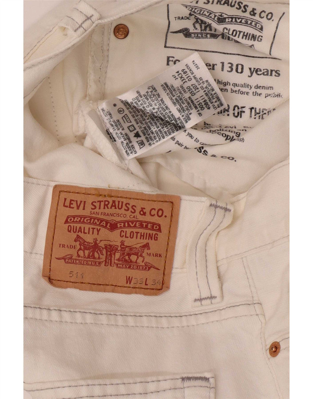 Damskie jeansy Levi's 511 Slim W33 L34 Biała bawełna