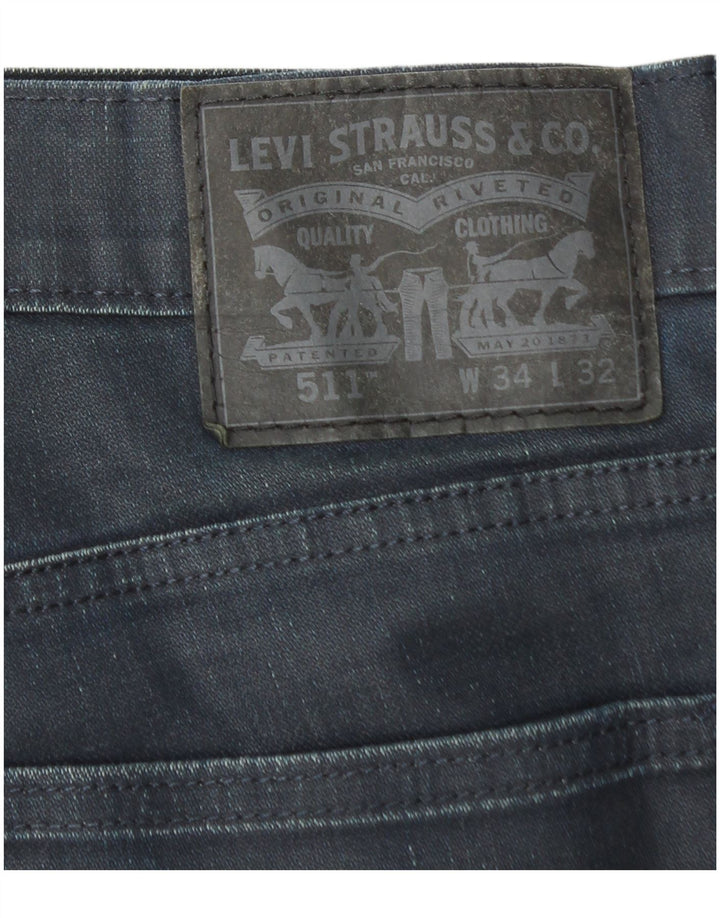 Męskie jeansy Levi's 511 Slim W34 L32 Granatowa bawełna