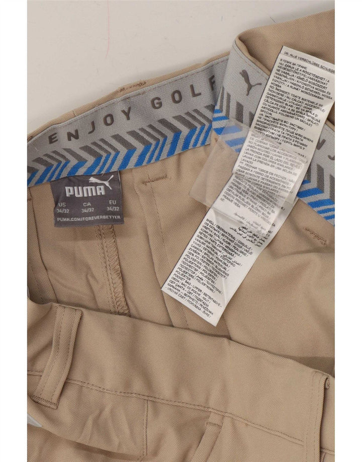 Męskie spodnie typu slim chino Puma W34 L32 beżowy poliester