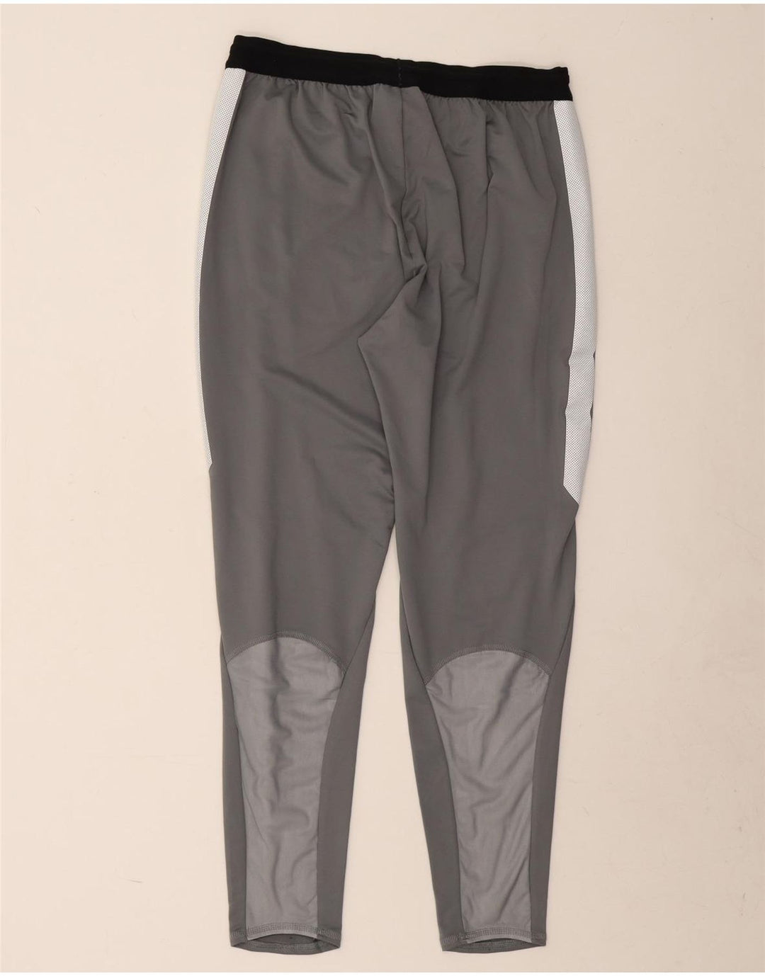Męskie spodnie dresowe Nike Dri Fit, duży szary poliester z blokami kolorów
