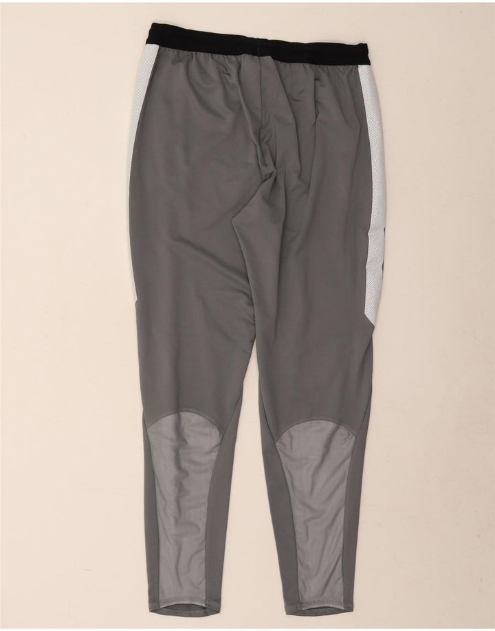 Męskie spodnie dresowe Nike Dri Fit, duży szary poliester z blokami kolorów