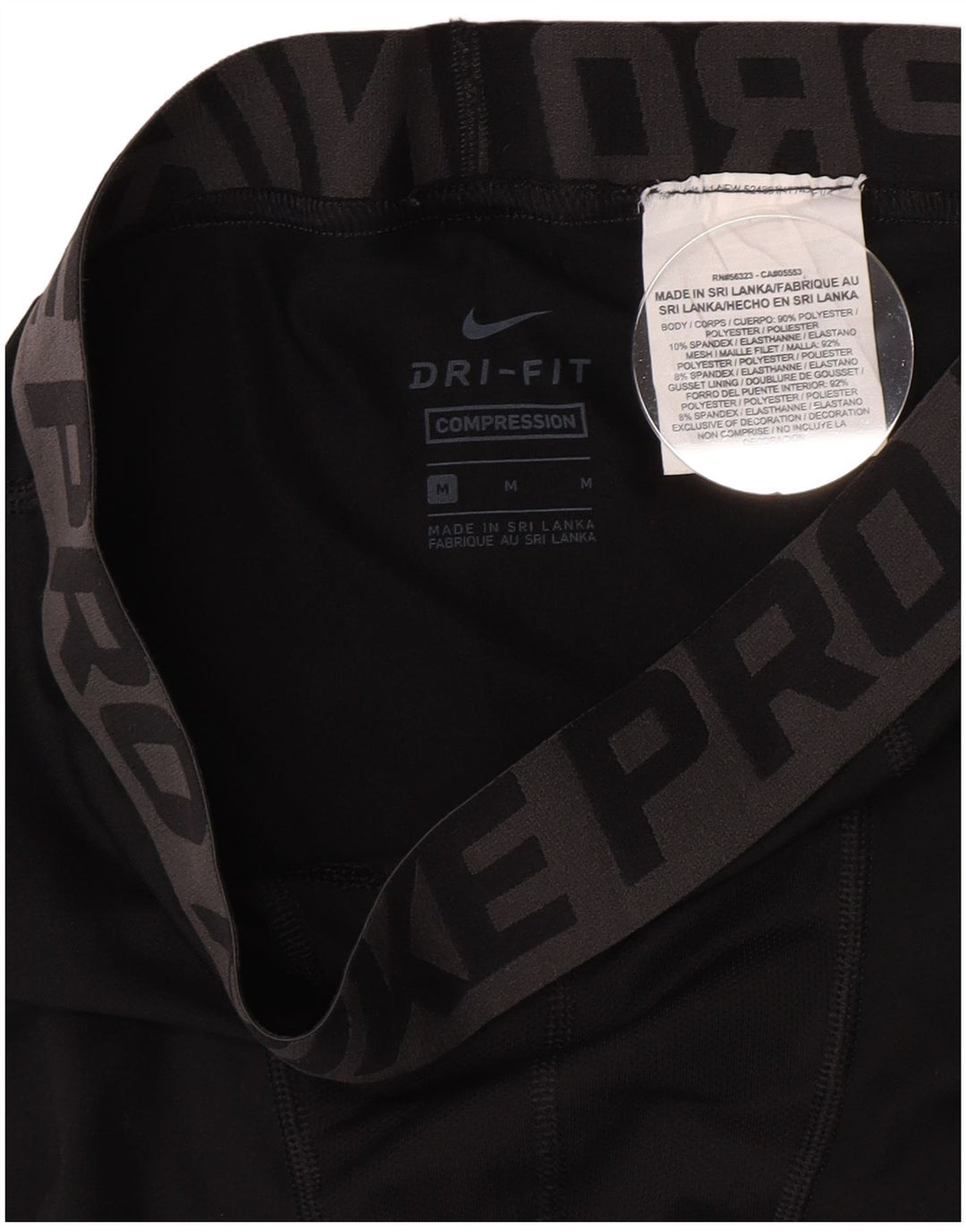 Chłopięce legginsy Nike Compression Graphic 10-11 lat, średni czarny poliester