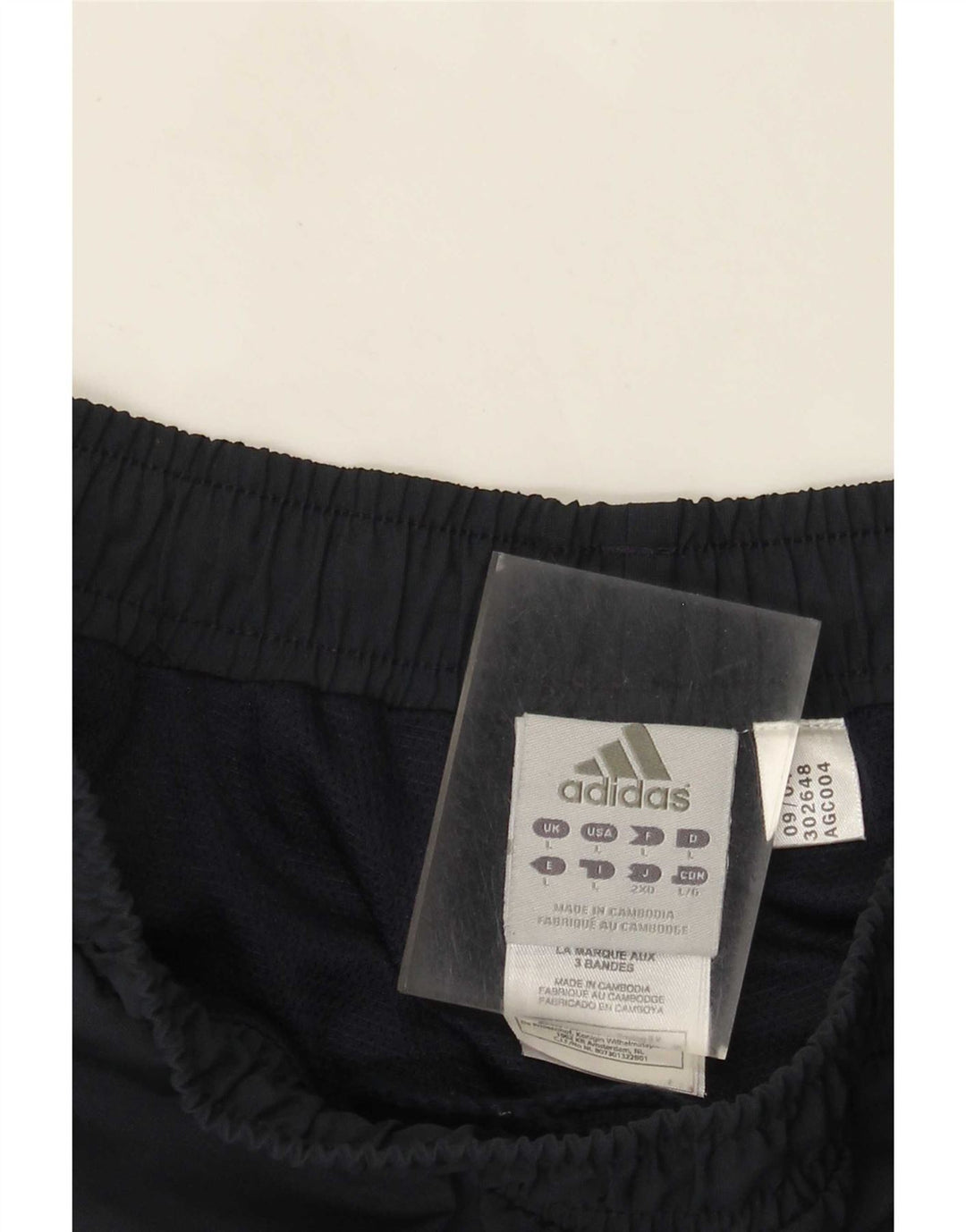 Męskie spodnie dresowe Adidas, duże, granatowe, poliestrowe paski