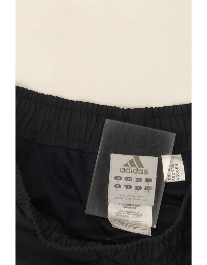 Męskie spodnie dresowe Adidas, duże, granatowe, poliestrowe paski