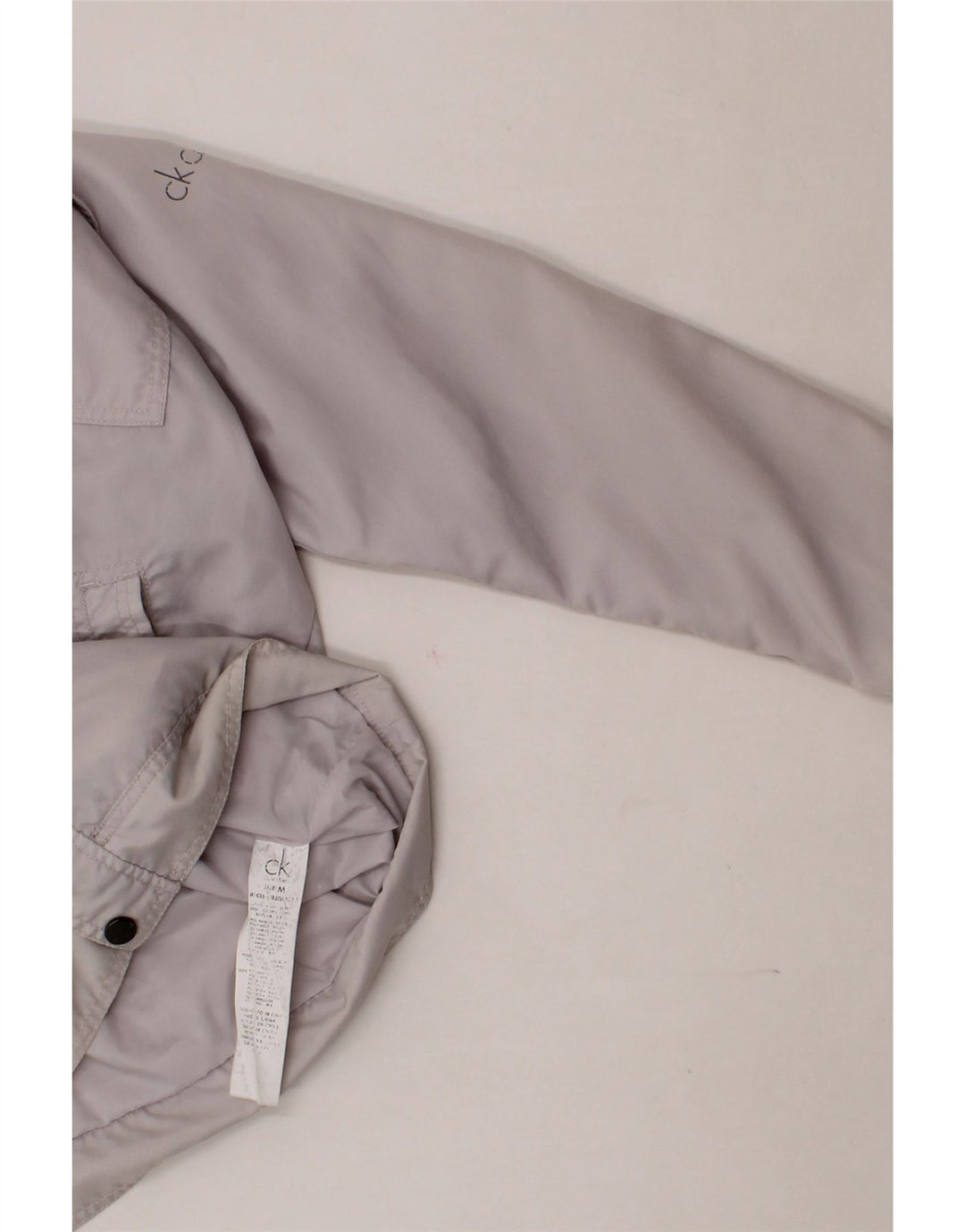 CALVIN KLEIN Mens Graphic Utility Jacket UK 38 Medium Off White Polyamide Vintage Calvin Klein and Second-Hand Calvin Klein from Messina Hembry 