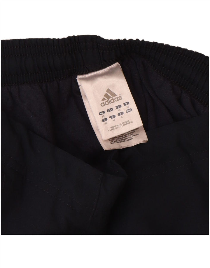 Damskie spodnie dresowe Adidas UK 12 Średni granatowy poliester