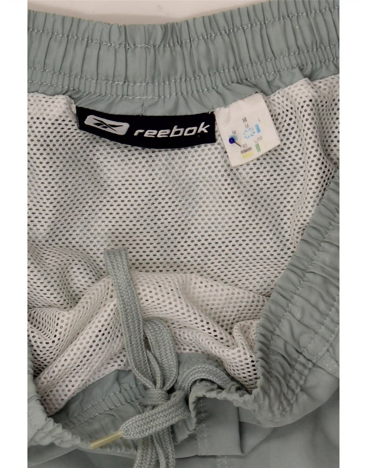 Męskie spodenki sportowe Reebok, średni niebieski, poliester