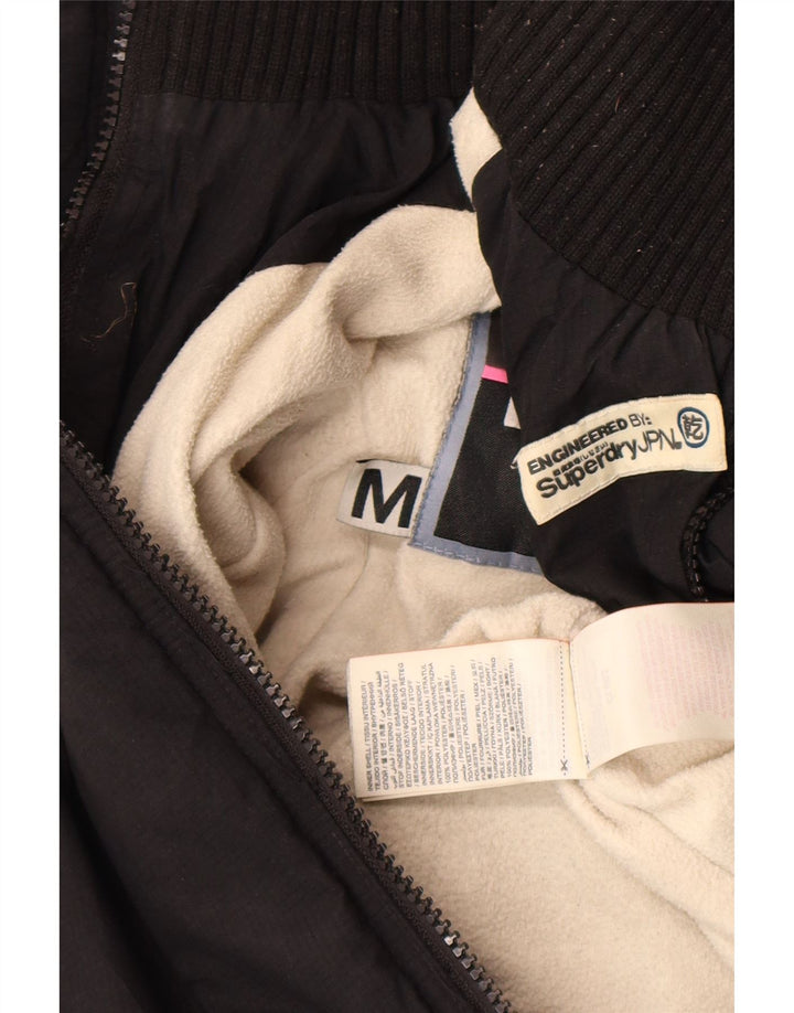 Damska kurtka wiatrówka z kapturem Superdry Graphic UK 14, średnia czarna