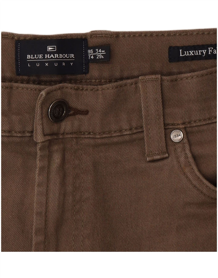 Marks & Spencer Męskie niebieskie dżinsy Harbor Straight W34 L29 Beżowa bawełna
