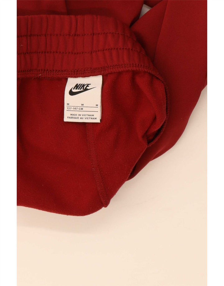 Spodnie chłopięce Nike Dresowe Joggery 10-11 lat, średni czerwony poliester
