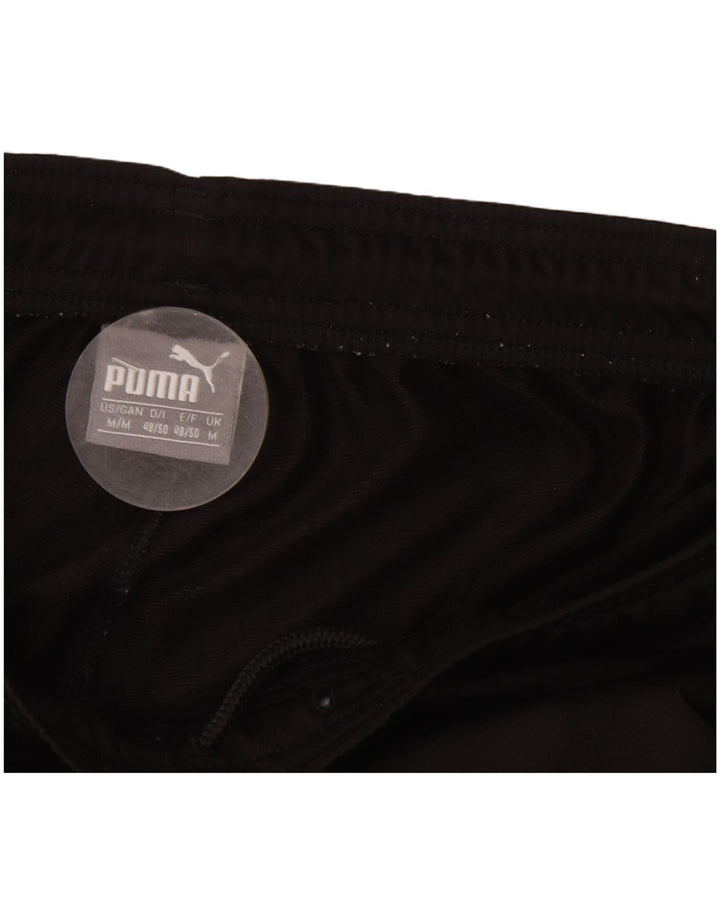 Męskie spodnie dresowe Puma, joggery, średnie czarne