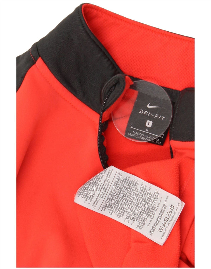 Męski dres Nike Dri Fit z zamkiem błyskawicznym i dużym czerwonym blokiem kolorów