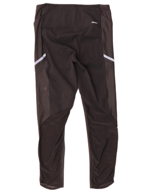 Legginsy damskie New Balance UK 12, średni czarny poliester