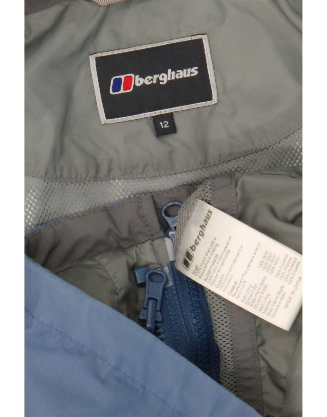 Damska kurtka przeciwdeszczowa z kapturem Berghaus UK 12, średni niebieski nylon